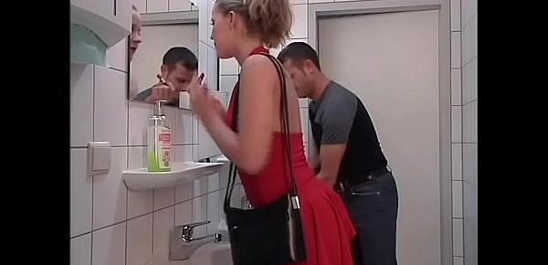 A cute and naive blondie is buggered in a toilet